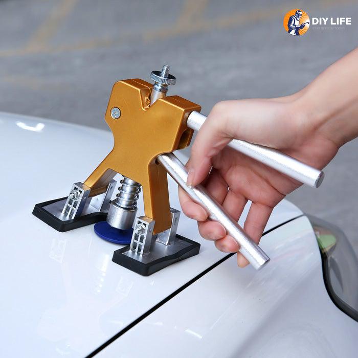 Dent Puller repairing a vehicle dent